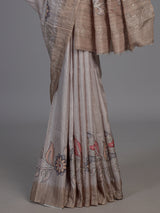 Beige art tusser silk saree with peacock floral motifs