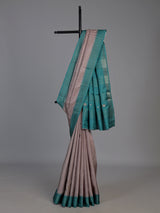 Beige tusser silk saree with regal zari border detailing