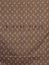 Pastel beige cotton silk saree with elegant bird motifs