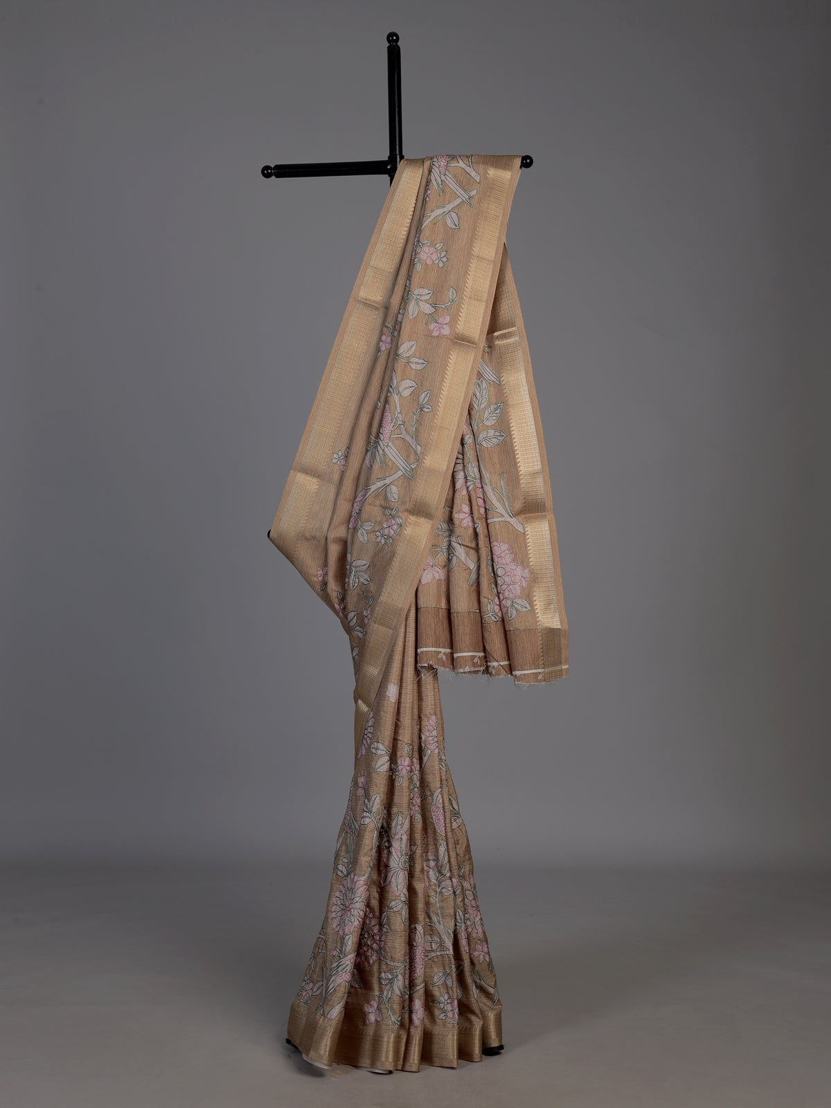 Pastel beige cotton silk saree with elegant bird motifs