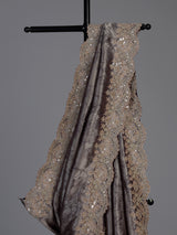 Pastel grey tissue silk saree with delicate pearl zari embellishments