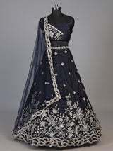 Navy blue silk lehenga choli adorned with floral stonework