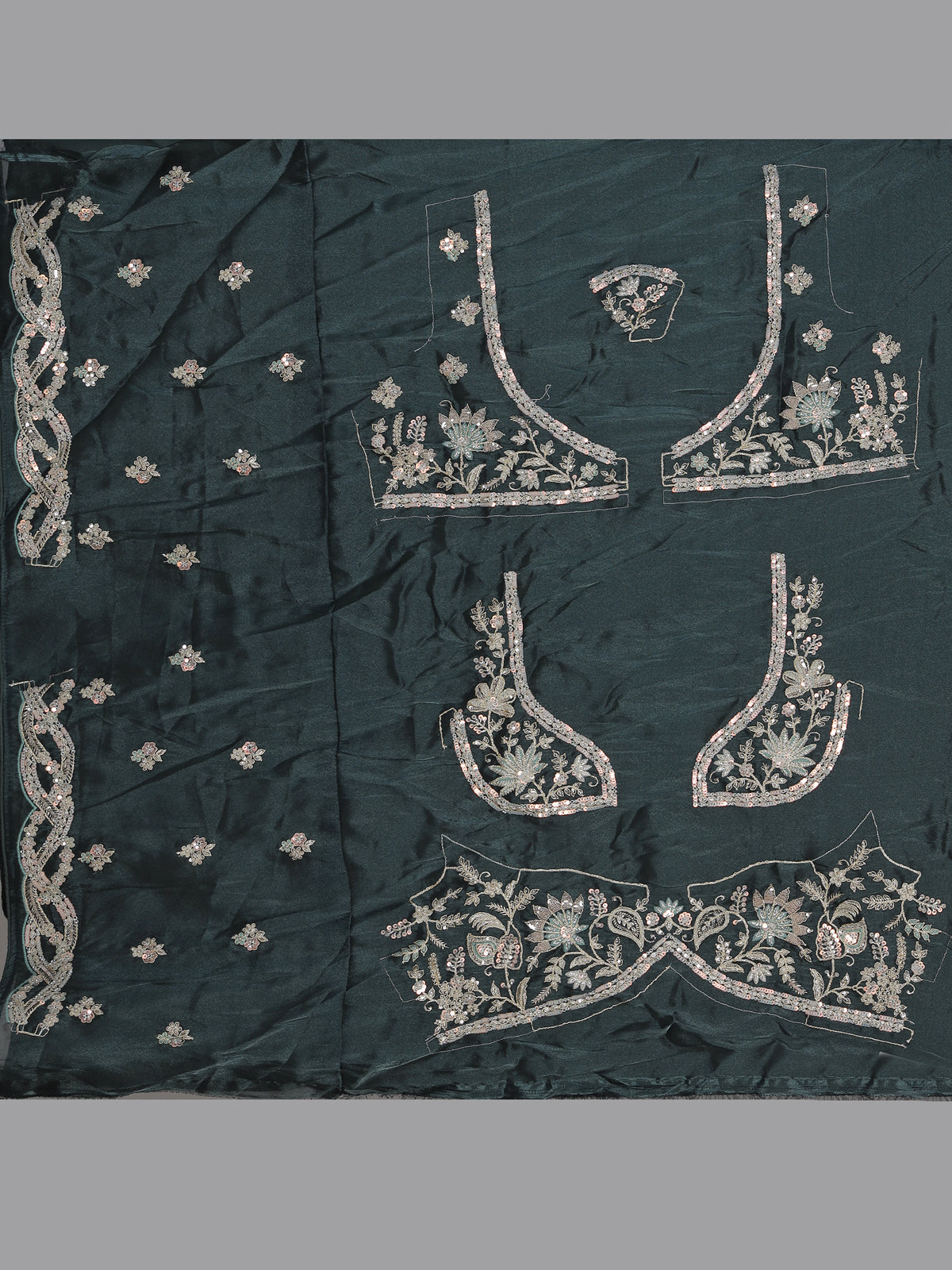 Peacock green silk lehenga choli with floral zardosi embellishments