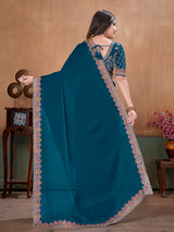 Peacock blue graceful embroidered satin festive saree