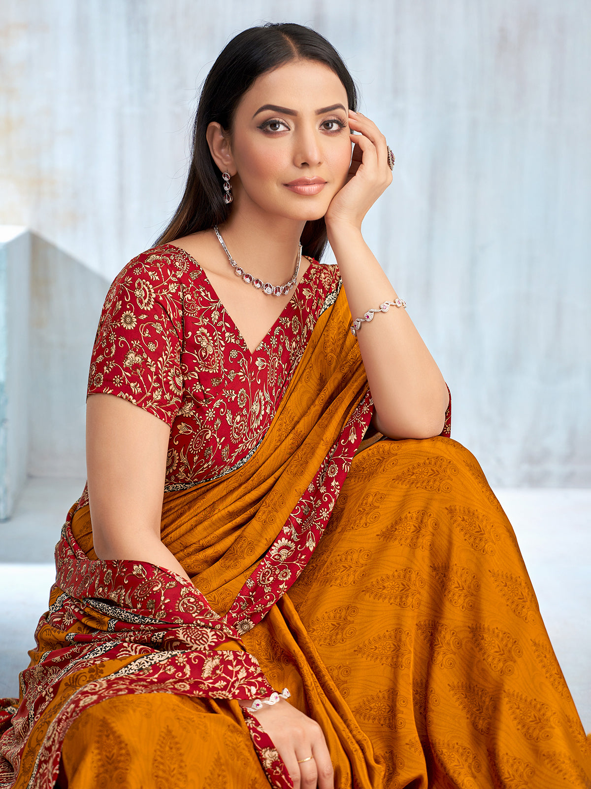 Mustard yellow floral printed contrast border and pallu saree