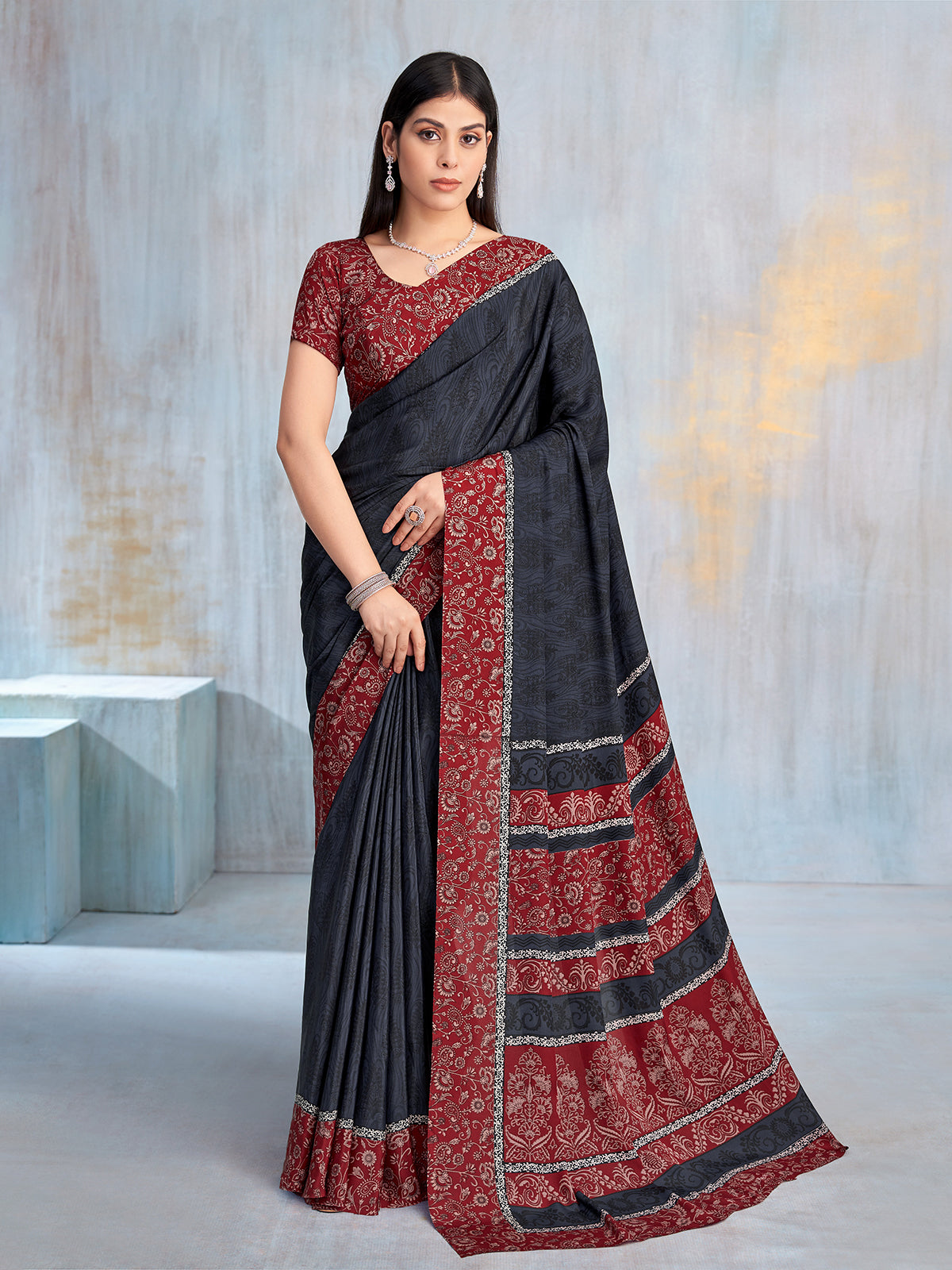 Charcoal black floral printed contrast border and pallu saree