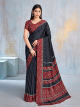 Charcoal black floral printed contrast border and pallu saree