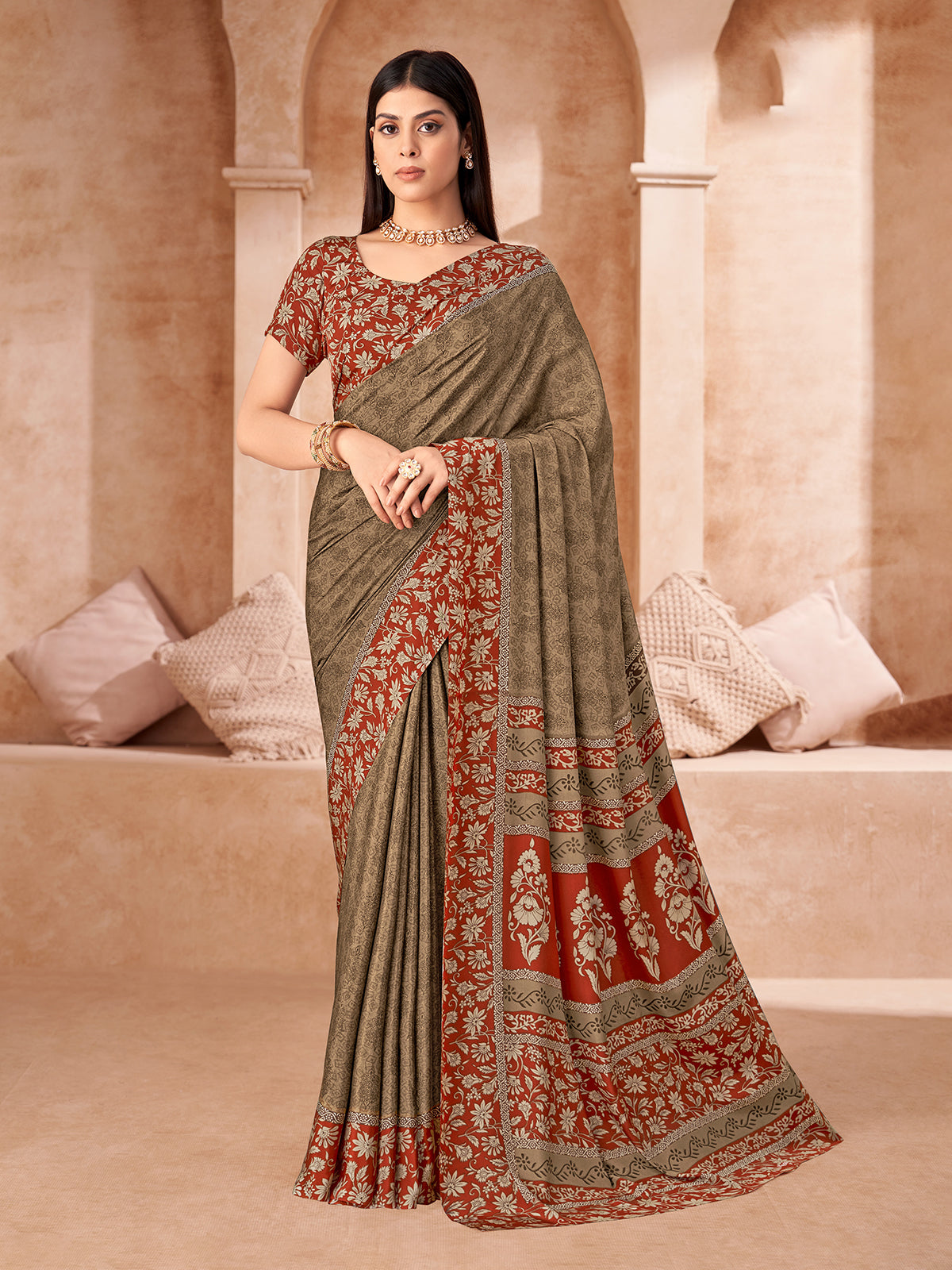 Brown printed crepe silk saree with unstitched blouse