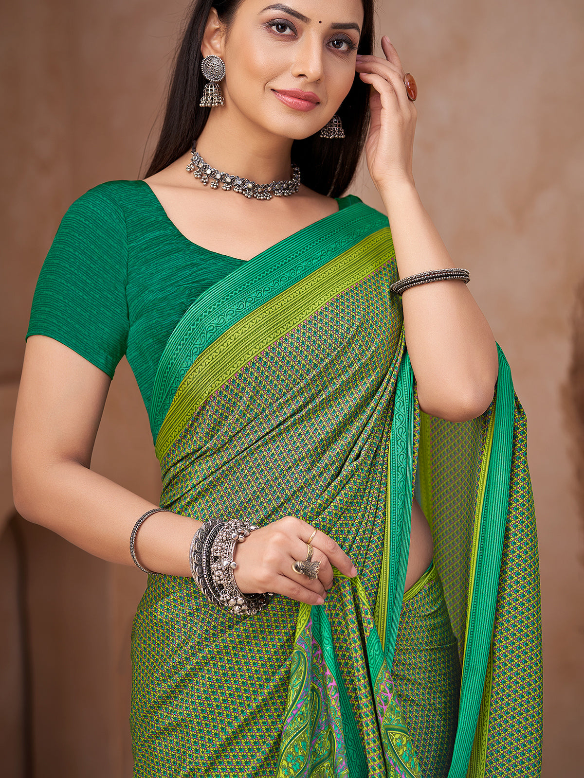 Green geometric printed crepe silk saree