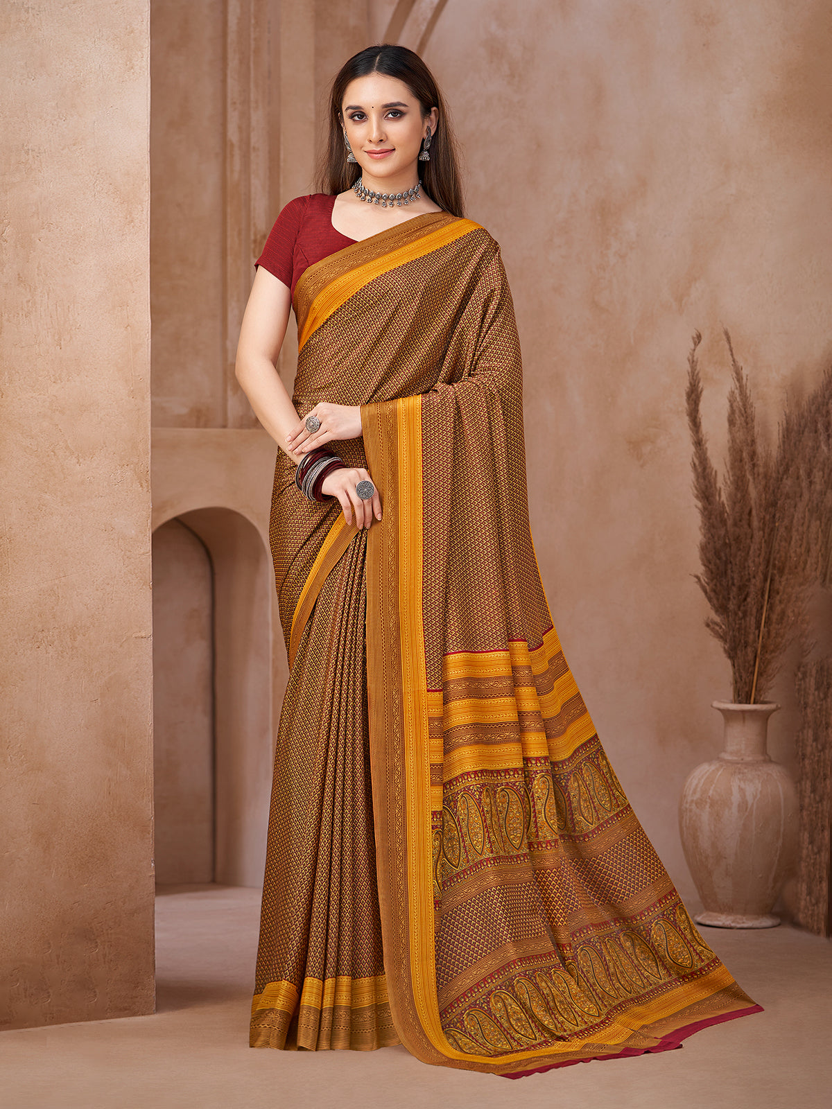 Yellow traditional printed crepe silk saree