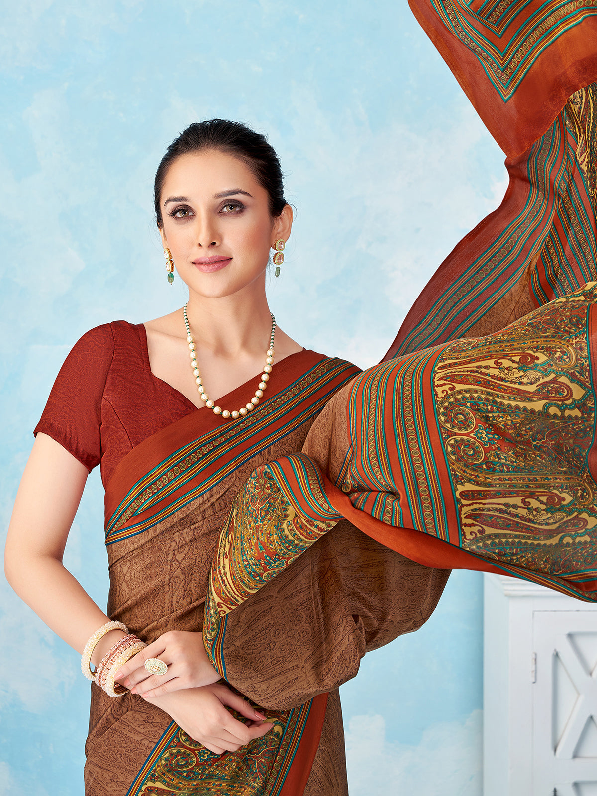 Rust brown printed crepe silk saree with unstitched blouse