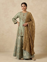 Pastel green women gold floral sharara suit