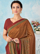 Rust orange printed crepe silk saree