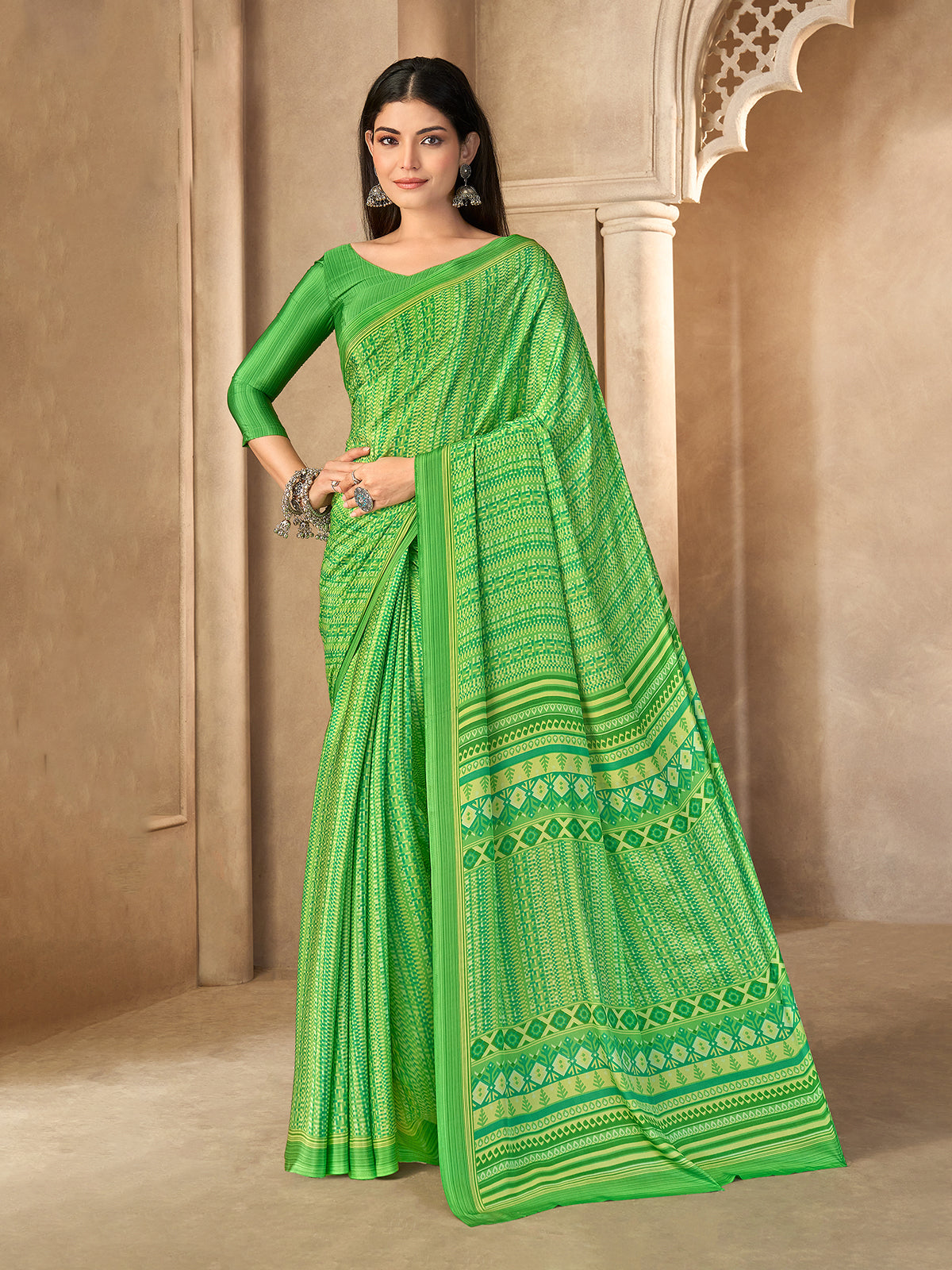 Green crepe silk printed saree with unstitched blouse