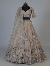 Beige tissue silk lehenga choli with luxurious designer embellishments