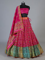 Rani pink silk unstitched lehenga choli with patola artistry