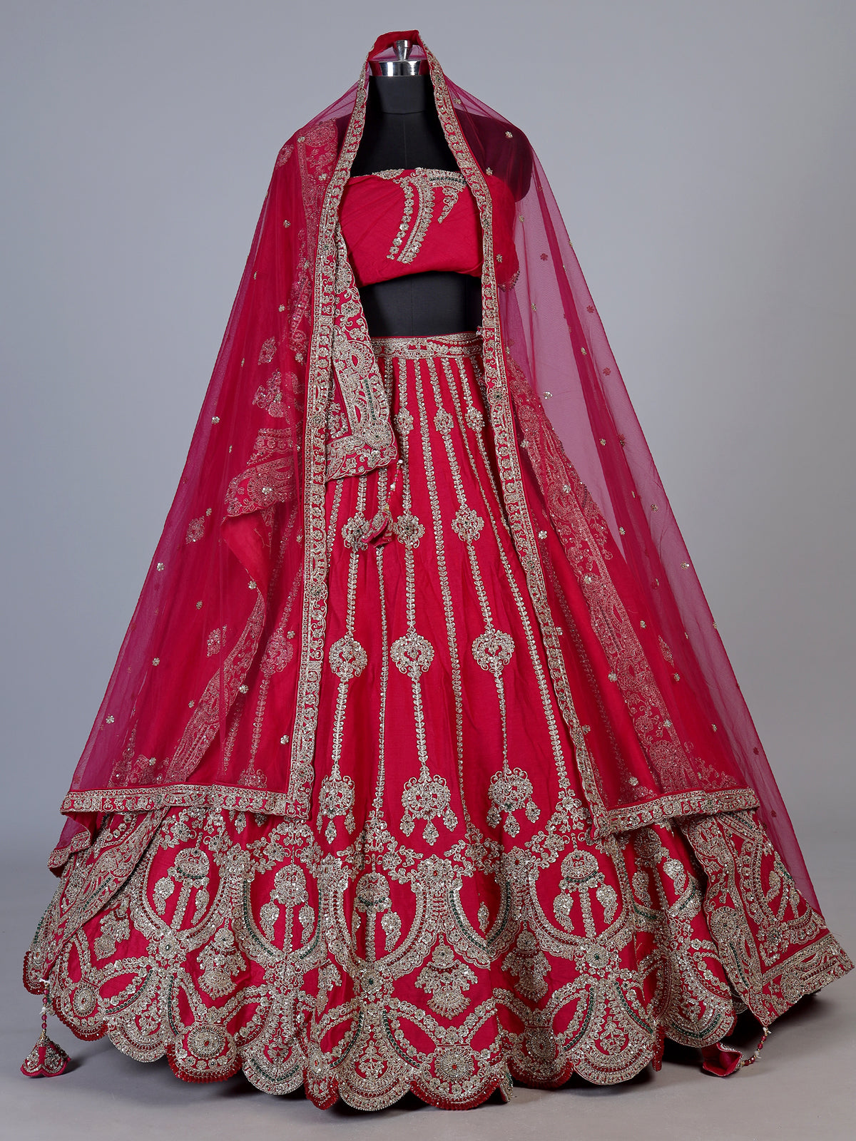 Rani pink silk unstitched bridal lehenga choli with double dupattas