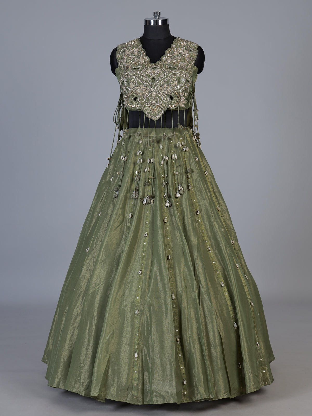 Mehendi green tissue silk lehenga choli with ornate zari craftsmanship