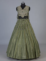 Mehendi green tissue silk lehenga choli with ornate zari craftsmanship