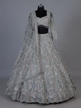 Ice blue net lehenga choli with shimmering diamond embellishments