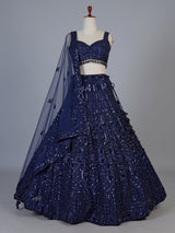 Blue net lehenga choli with intricate pearl cutdana embellishments