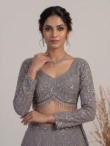 Lavender purple net lehenga choli with sparkling diamond tassel detailing