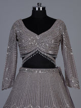 Lavender purple net lehenga choli with sparkling diamond tassel detailing