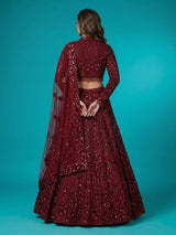 Maroon net lehenga choli with luxurious pearl cutdana embellishments
