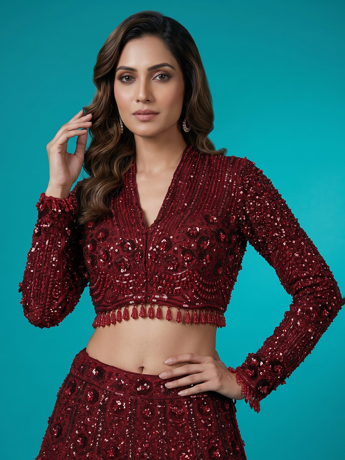 Maroon net lehenga choli with luxurious pearl cutdana embellishments