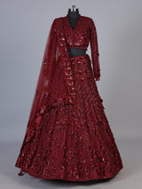 Maroon net lehenga choli with luxurious pearl cutdana embellishments