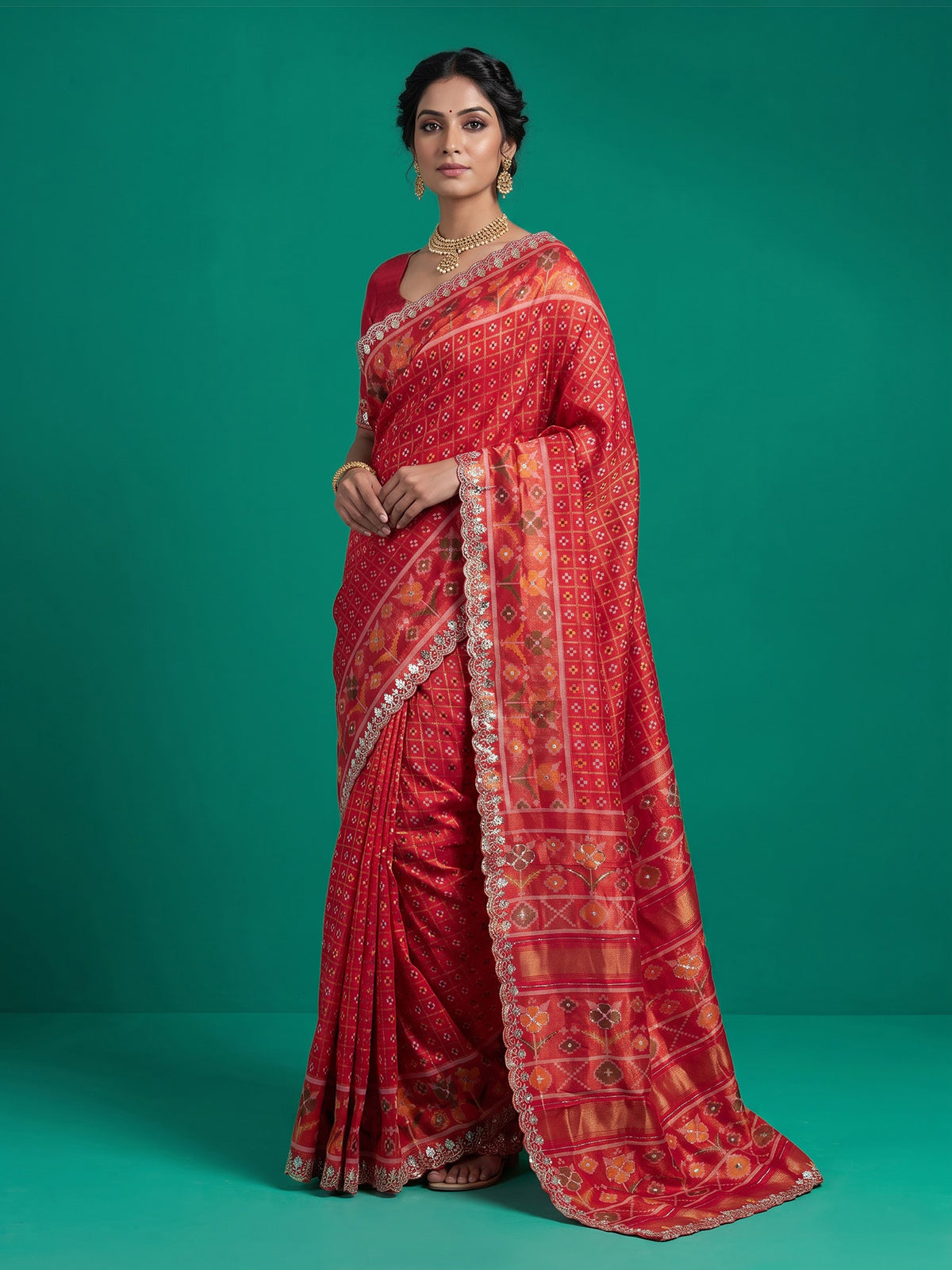 Red soft silk saree with traditional ikat printed zari elegance