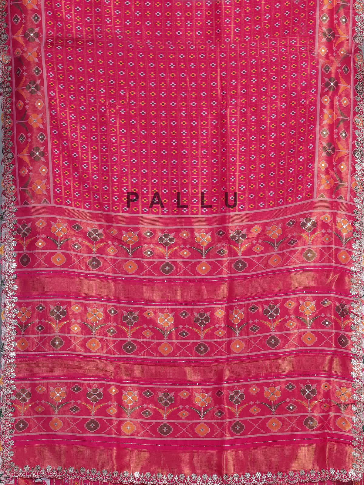Rani pink soft silk saree with vibrant ikat printed elegance