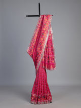 Rani pink soft silk saree with vibrant ikat printed elegance