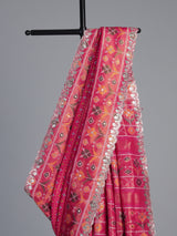 Rani pink soft silk saree with vibrant ikat printed elegance