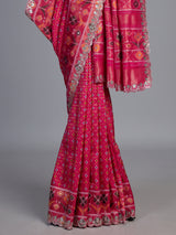 Rani pink soft silk saree with vibrant ikat printed elegance