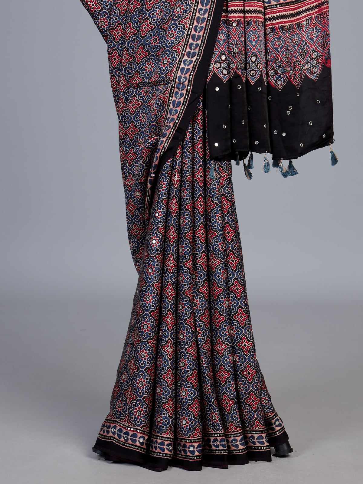 Blue and black crepe silk saree with artistic printed detailing