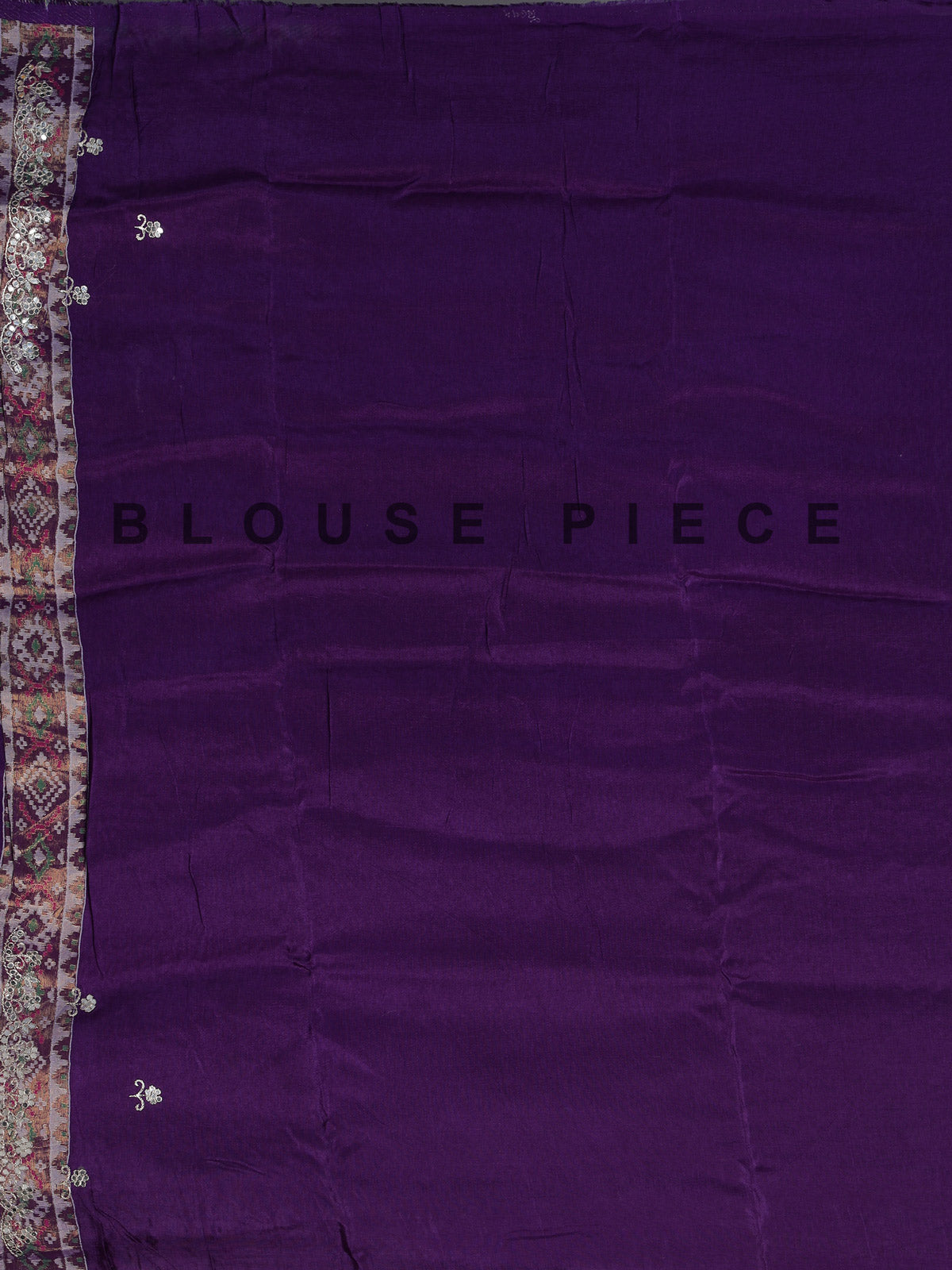 Purple soft silk saree with shimmering ikat printed embellishments