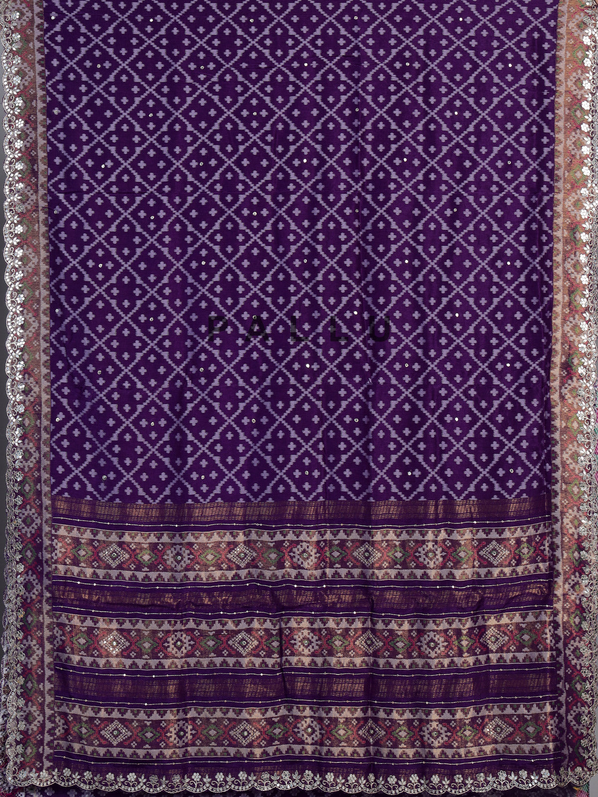Purple soft silk saree with shimmering ikat printed embellishments