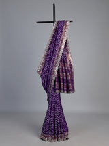 Purple soft silk saree with shimmering ikat printed embellishments