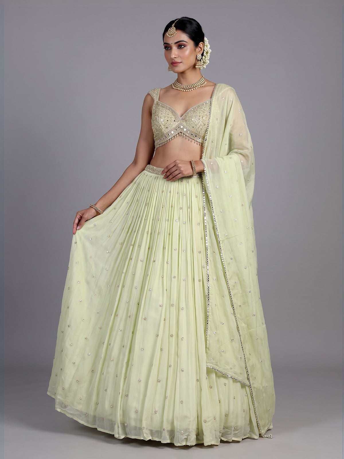 Pista green embellished chiffon lehenga choli with dupatta