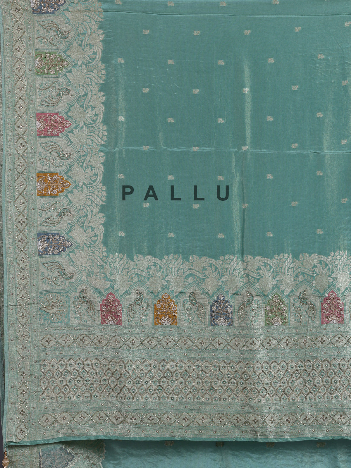 Mint blue silk saree with elegant peacock motif work