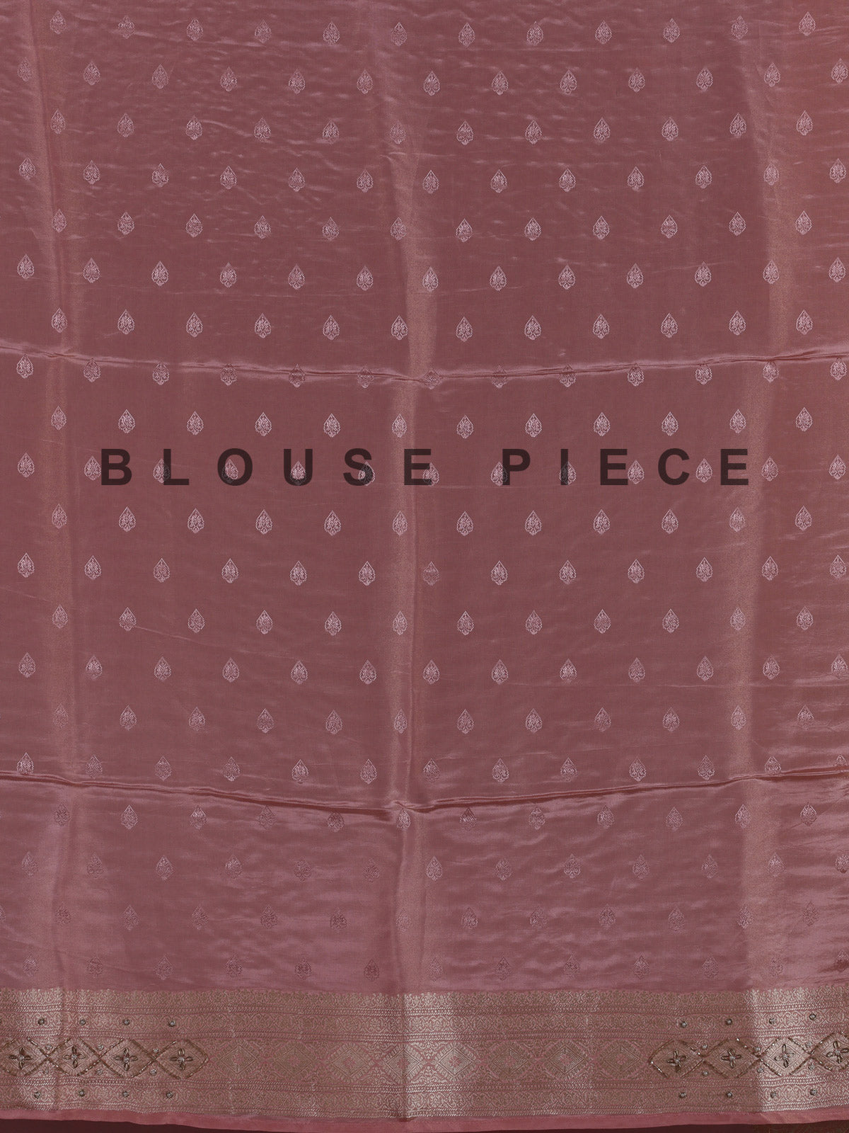 Pink silk saree with graceful peacock motif embellishments