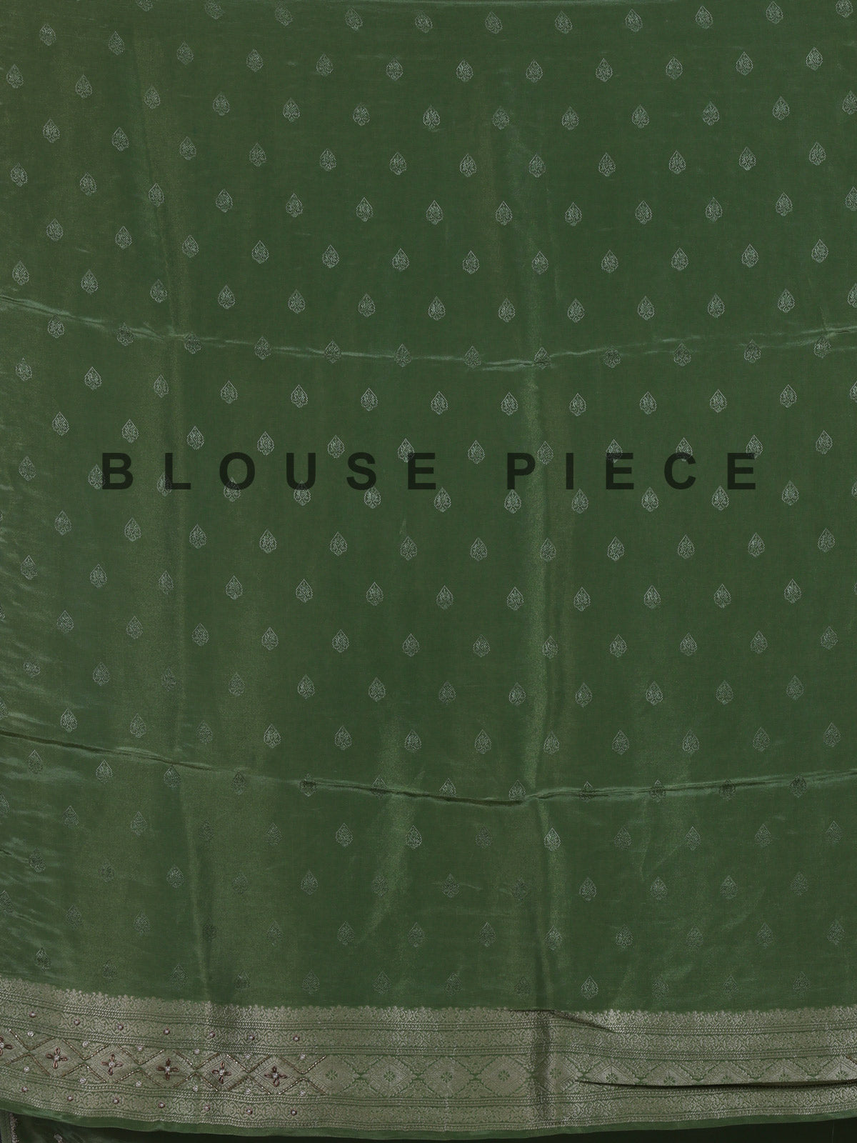 Pista green silk saree with elegant peacock motif embellishments