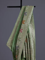 Pista green silk saree with elegant peacock motif embellishments
