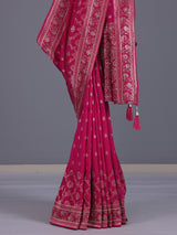 Rani pink silk saree with elegant butti work