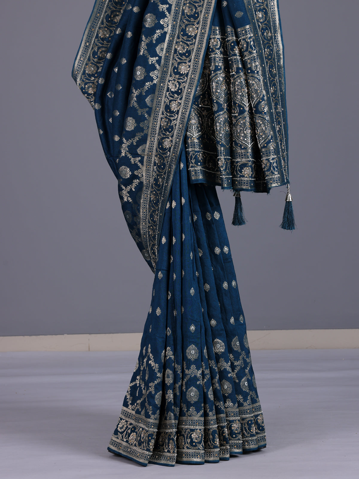 Peacock blue silk saree with exquisite traditional embellished detailing