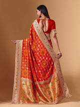 Orange georgette saree with sparkling animal motif detailing