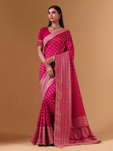 Rani pink dola silk saree with elegant zari butti work