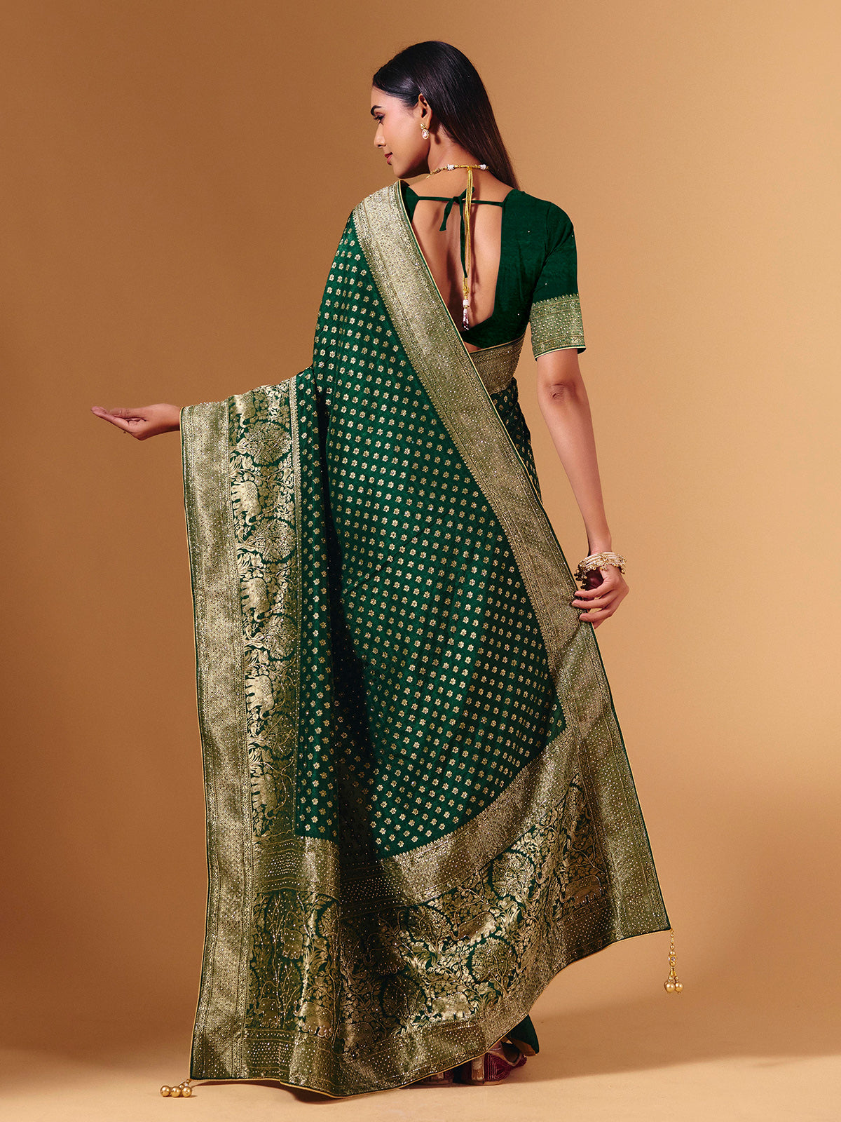 Green dola silk saree with elephant motif festive elegance