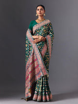 Rama green modal silk saree with mirror animal motif detailing
